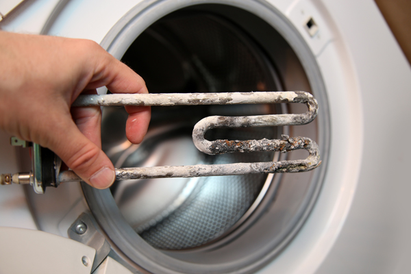 details closeup shot of electric heater from washing machine