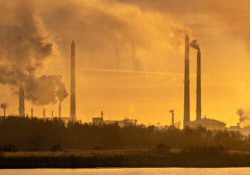 Smoking chemical plant chimneys,panorama.Air environment pollution concept.